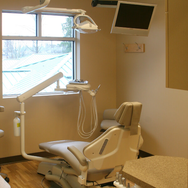 Dentist chair inside examination room at Gentle Smile Dentistry